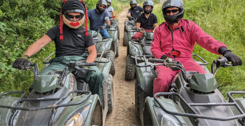 Stag party quad biking group on trail
